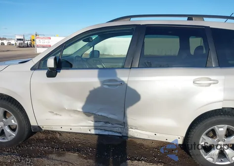 2015 Subaru Forester 2.5I Limited из США, поврежденный, VIN JF2SJAHC9FH401827